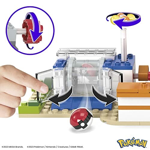 Hand met bouwstenen van Pokemon-set